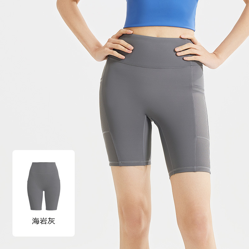Bolsillo lateral estriado, cintura alta, pantalones cortos, pantalones deportivos apretados de cinco puntos.