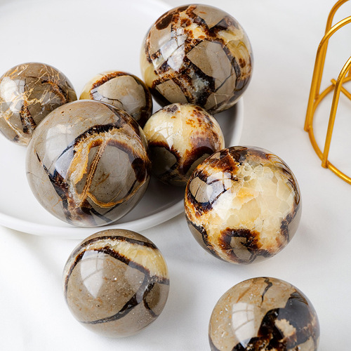 Natural turtle stone spherical ornaments mineral crystal jewelry rough stone polishing crafts manufacturers wholesale