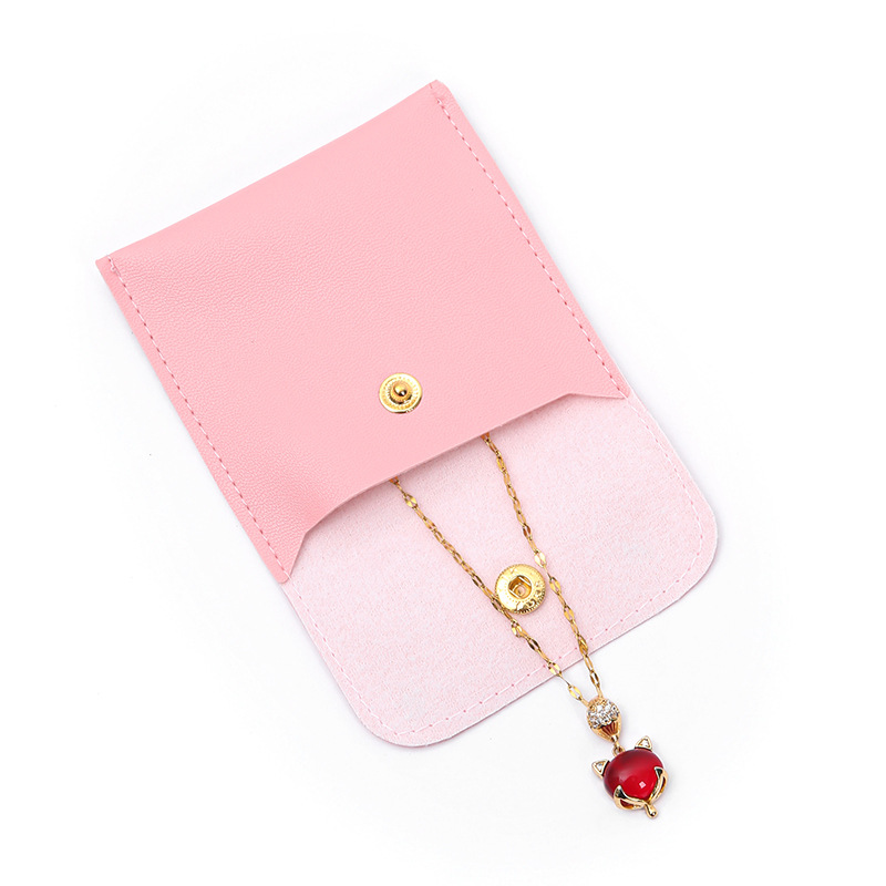 Bolsas de joyería de cuero PU nicho botón diseño collar anillo pulsera bolsa de almacenamiento antioxidante al por mayor