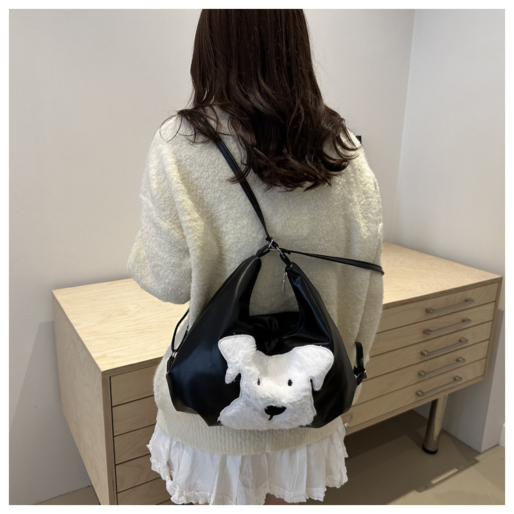 The new autumn and winter 2024 fashion cartoon backpack with simple, individual and niche design, single-shoulder bag and commuter tote bag undefined