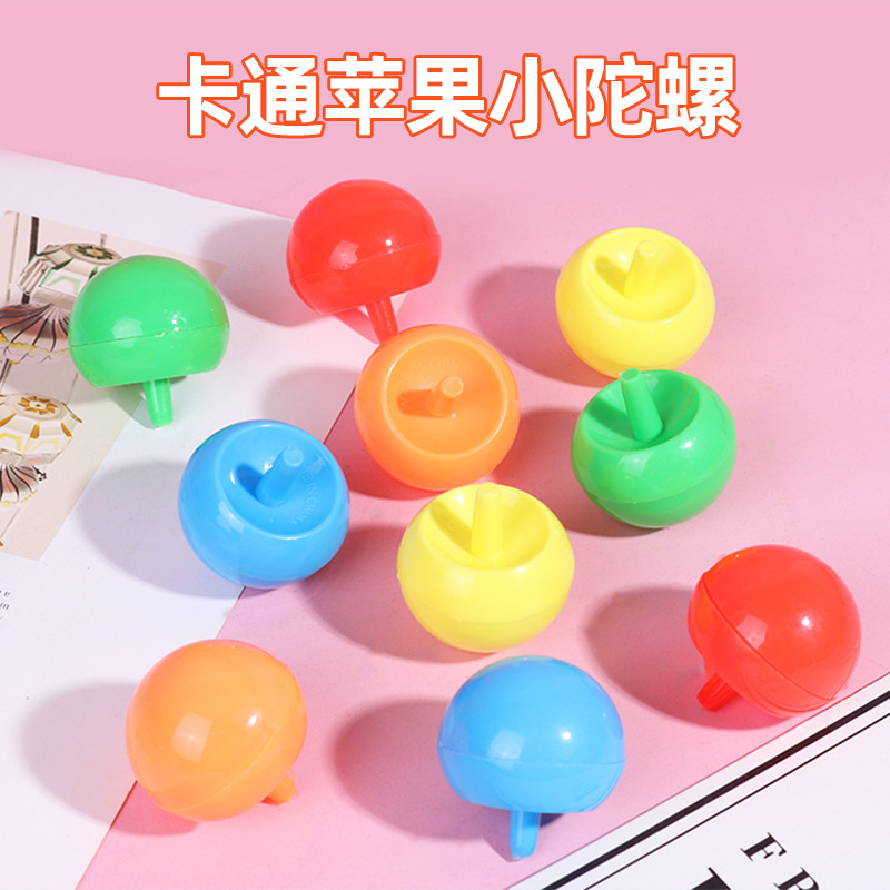 Mercado nocturno de Qiankun invertido, giroscopio, mini giratorio de manos, pequeño puesto de juguetes giratorio, juguetes para niños, giroscopio de manzana