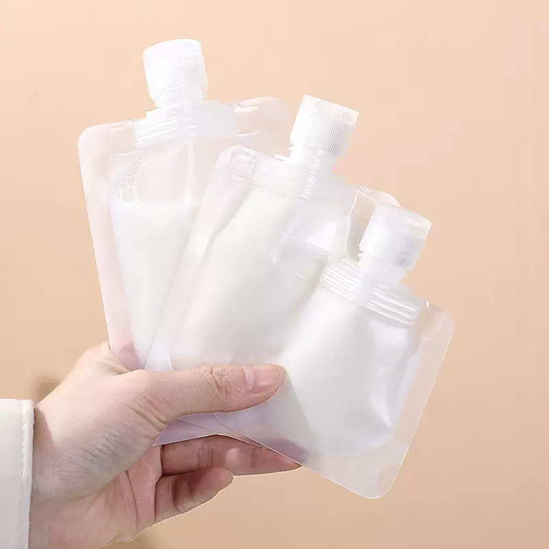 旅行乳液分装袋100ml化妆品液体收纳瓶洗发沐浴露翻盖吸嘴分装袋