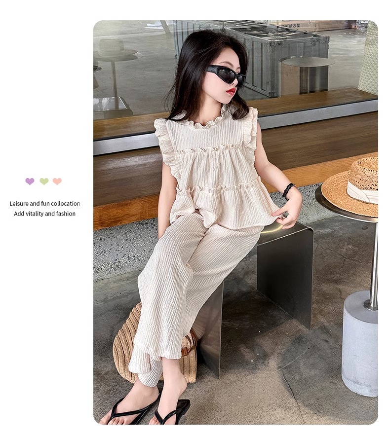 Completo bimba top senza maniche e pantaloni gamba larga_voghion.com