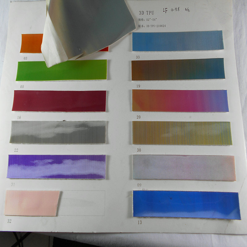 3D幻彩TPU金属镜面PU贴膜手袋料包装革人造革PU毛底金属革面料批