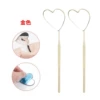 Heart-shaped examination mirror golden