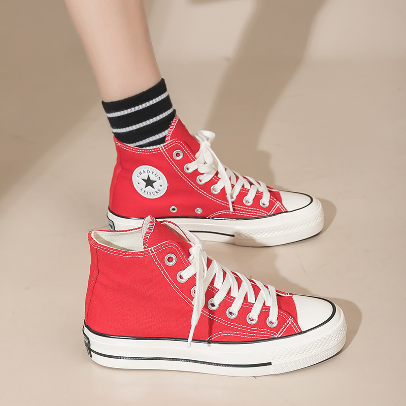 Año Nuevo 2026, zapatos de lona de alto nivel rojo para mujeres, zapatos casuales con suela de goma, moda de zapatos de alto nivel transpirables.