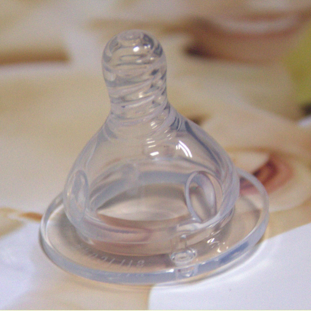 Venta directa de fábrica de pezón de silicona de sentido real Leche materna espiral de boca ancha bebé