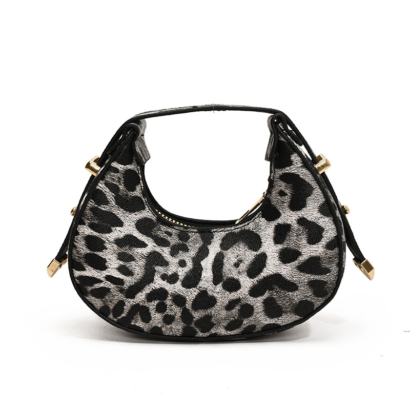 Tendencia nueva bolsa de mujer casual 2024 personalidad coreana de invierno mini media luna temperamento leopardo bolso de mano