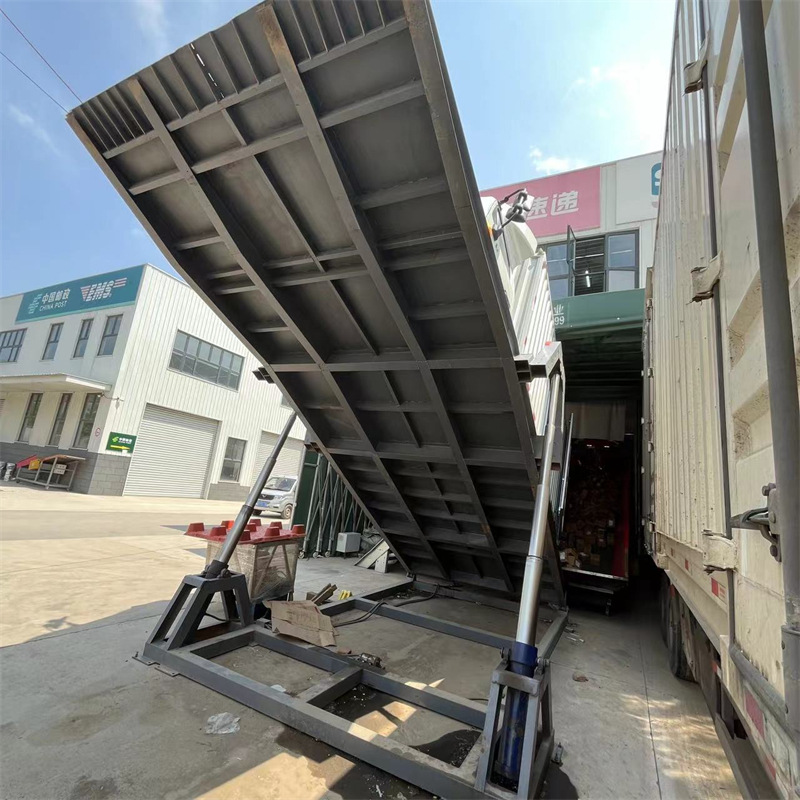 移动式快递分拣液压翻板货架卸车机邮政智慧物流平台厂家升降式