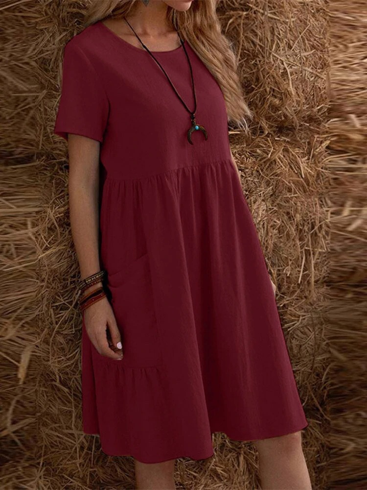 2026 Summer European And American Retro Loose Pocket Solid Color Round Neck Women's Dress_ecoleips.com