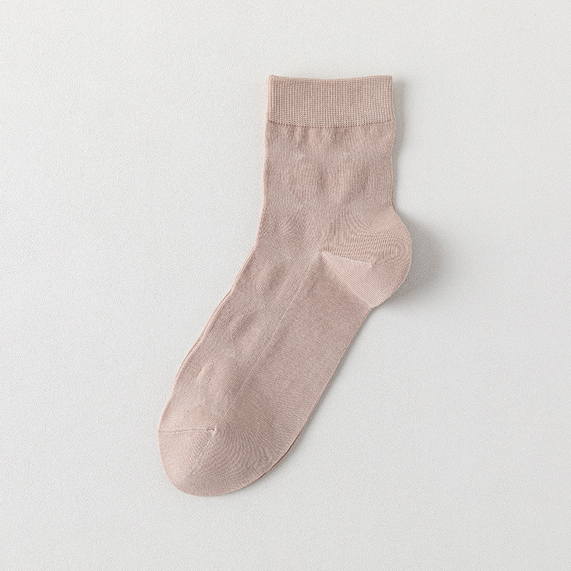 Calcetines de algodón de color sólido para hombres primavera y otoño medio tubo de diamante sin hueso transpirable absorción de sudor embalaje independiente calcetines de hombre al por mayor