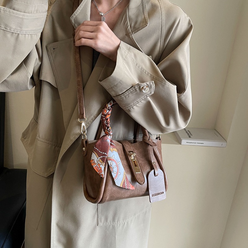 De alta calidad retro Maillard bolso de las mujeres 2023 nueva moda del todo-fósforo cubo bolsa de hombro de estilo coreano