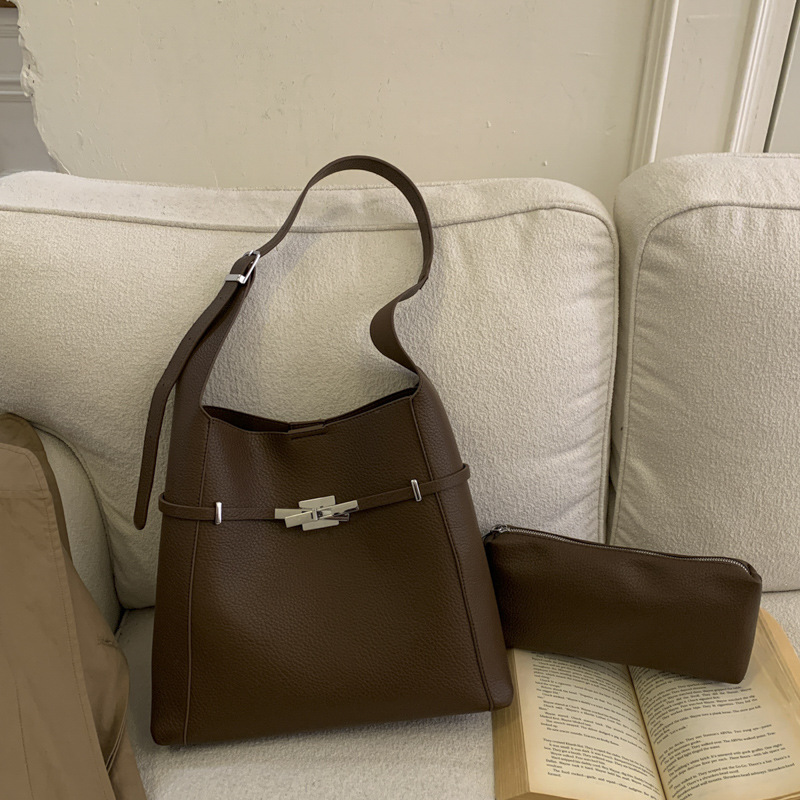 Transfronterizo de alto nivel nicho de hombro bolso de viaje bolsa para mujeres 2025 nuevo retro bolso de cubo