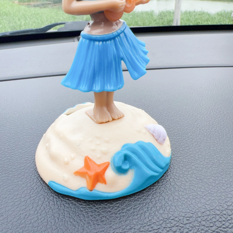 Transfronterizo Hawaii creativo swing falda de paja sacudiendo la cabeza muñeca adornos de coche adornos de dibujos animados regalos juguetes para niños