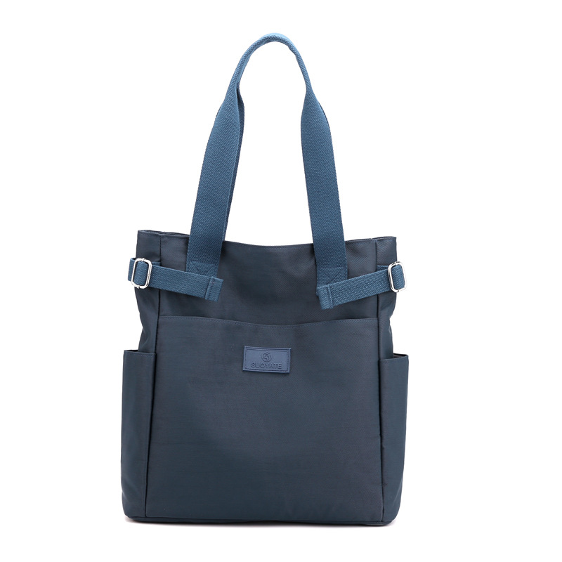 Nuevo bolso de hombro versátil de nailon para mujer, bolso de tela informal a la moda, bolso de lona para mujer, bolso de mano con gran capacidad