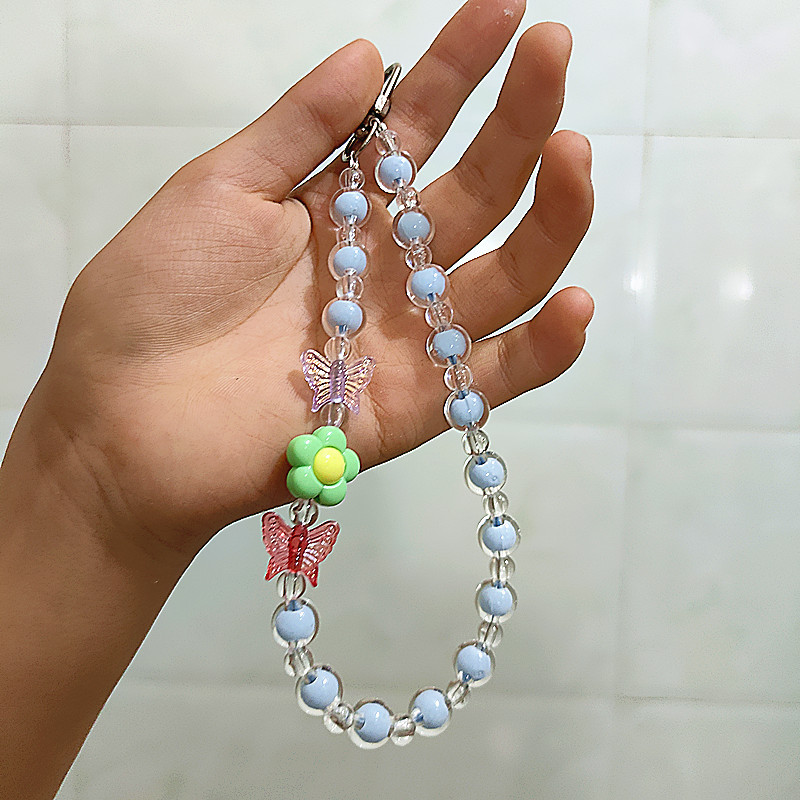 Flor Mariposa Caja del teléfono móvil Cadena con cuentas Douyin Bolso en vivo Auriculares Llavero Macaron Colgante Accesorios Cuerda