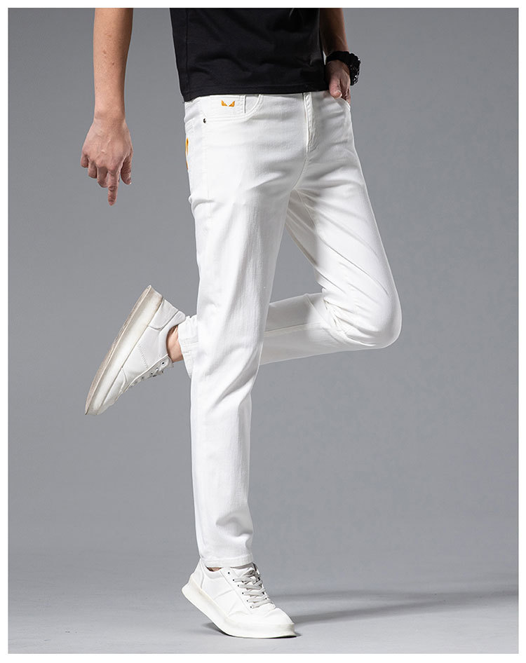 Jeans alla moda da uomo sottili primavera/estate Pantaloni con piedi elastici in cotone bianco slim fit ricamati di marca di fascia alta_voghion.com