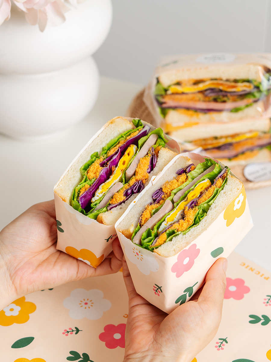 Papel de embalaje de sándwich impermeable a prueba de agua a prueba de aceite de grado alimenticio papel de película de limpieza de hamburguesas perros calientes mano agarrar pastel papel de embalaje comercial doméstico