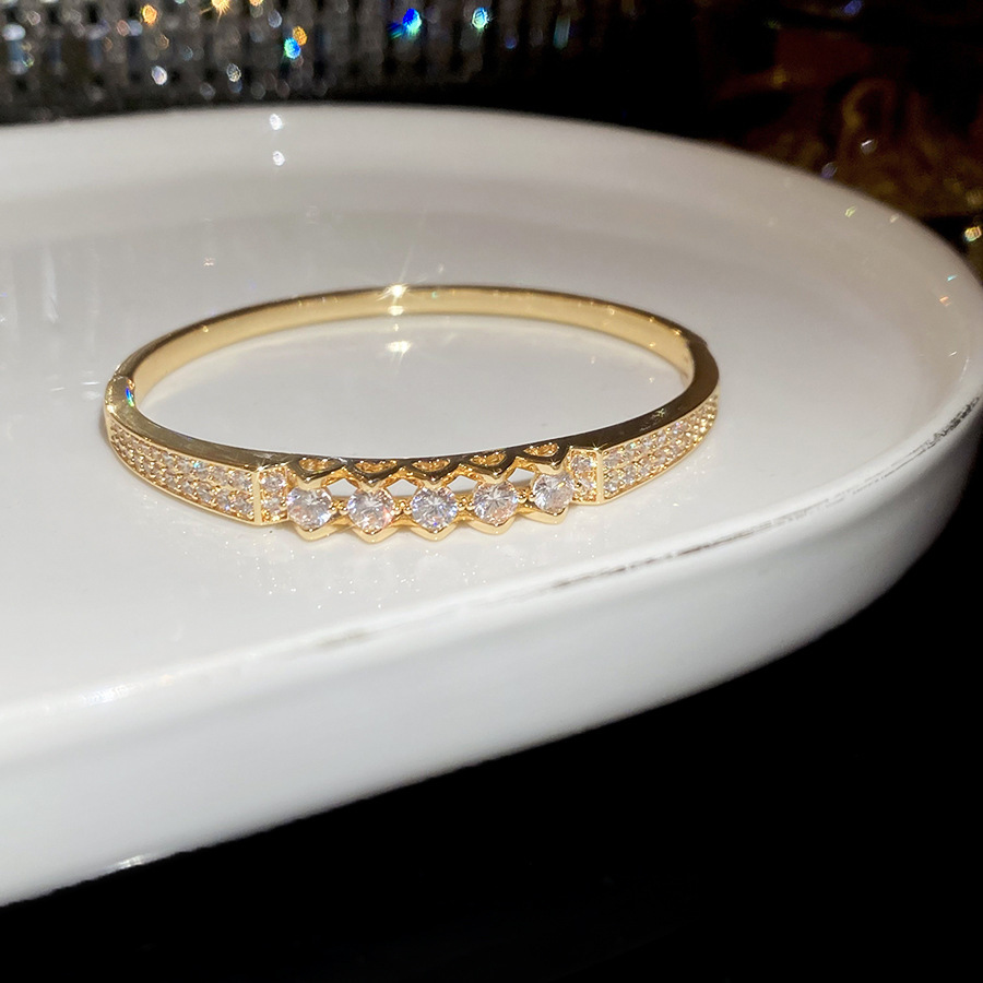 Pulsera 50 - Hueco de zircon (chapado en oro real)