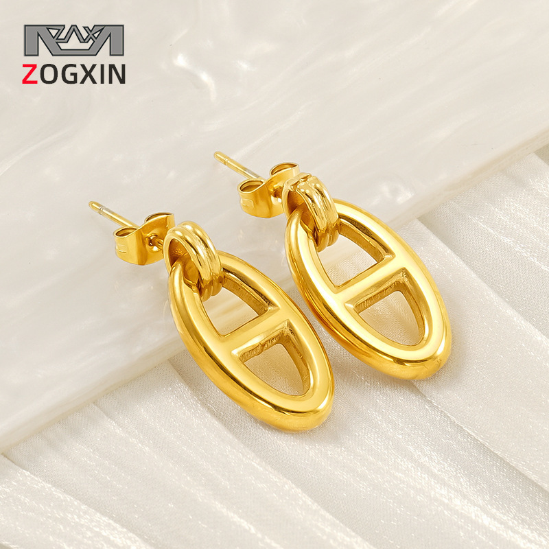 Pendientes de acero inoxidable de nariz de cerdo simple de moda europea y americana transfronteriza Pendientes japoneses huecos de estilo INS femenino Pendientes chapados de 18K