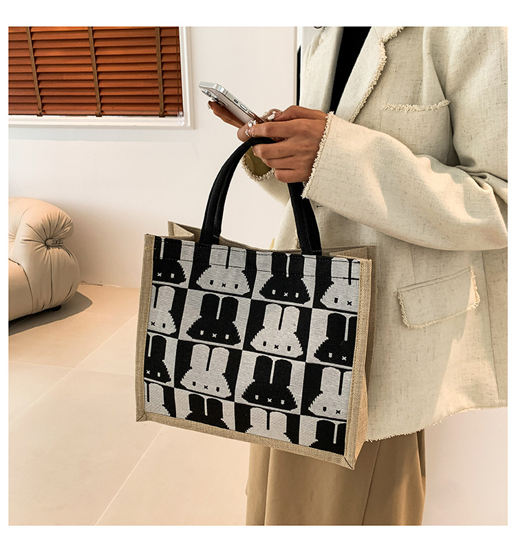 High-end mid-capacity canvas school commuting handbag 2024 new style fashionable and versatile linen single-shoulder tote bag undefined