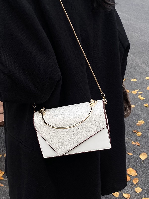 Nuevo estilo de bolso de mano metálico con lentejuelas para mujer, sencillo y a la moda, bolso de hombro cruzado con cadena, moderno y a la moda.