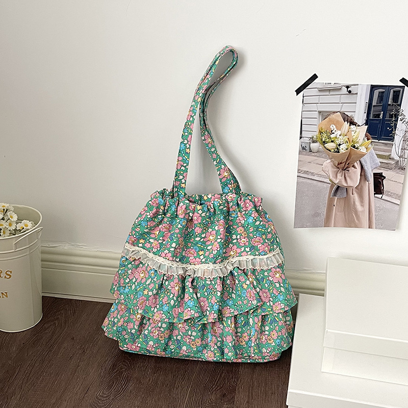 Bolsa de lona de flores coreana diaria para mujeres verano 2026 nueva moda encantadora niña brazo bolso de hombro