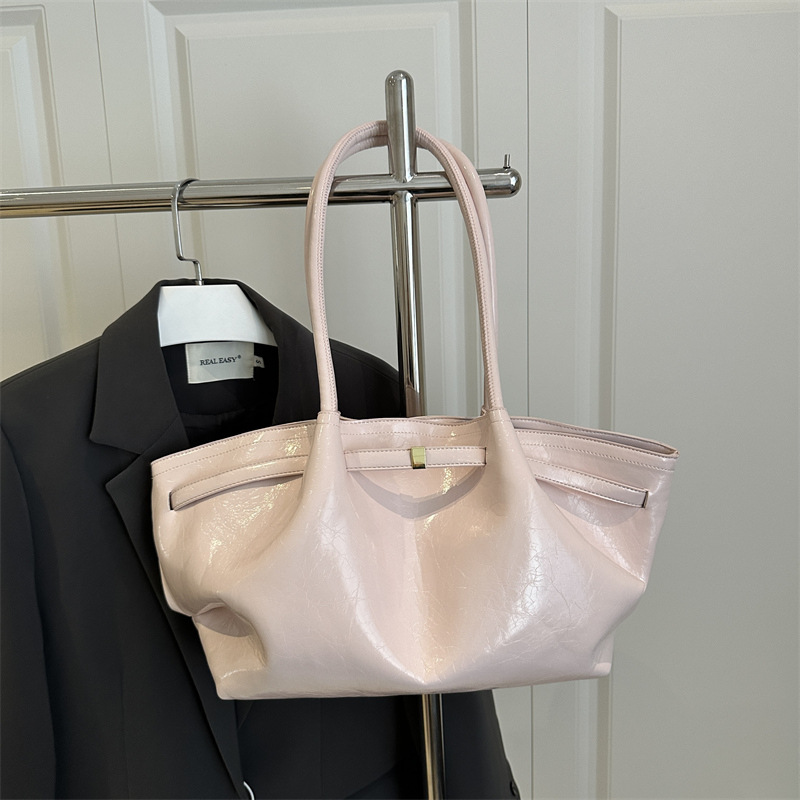 Bolsos de gran capacidad para mujer verano todo fósforo 2025 nuevo bolso de axila de un solo hombro de nicho de ocio bolso de viaje plisado
