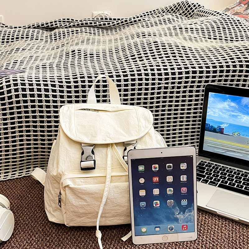 Mochila de lona de viajero multifuncional para estudiantes en clase Bolso femenino simple 2024 Nuevo estilo estilo coreano mochila pequeña estilo universitario