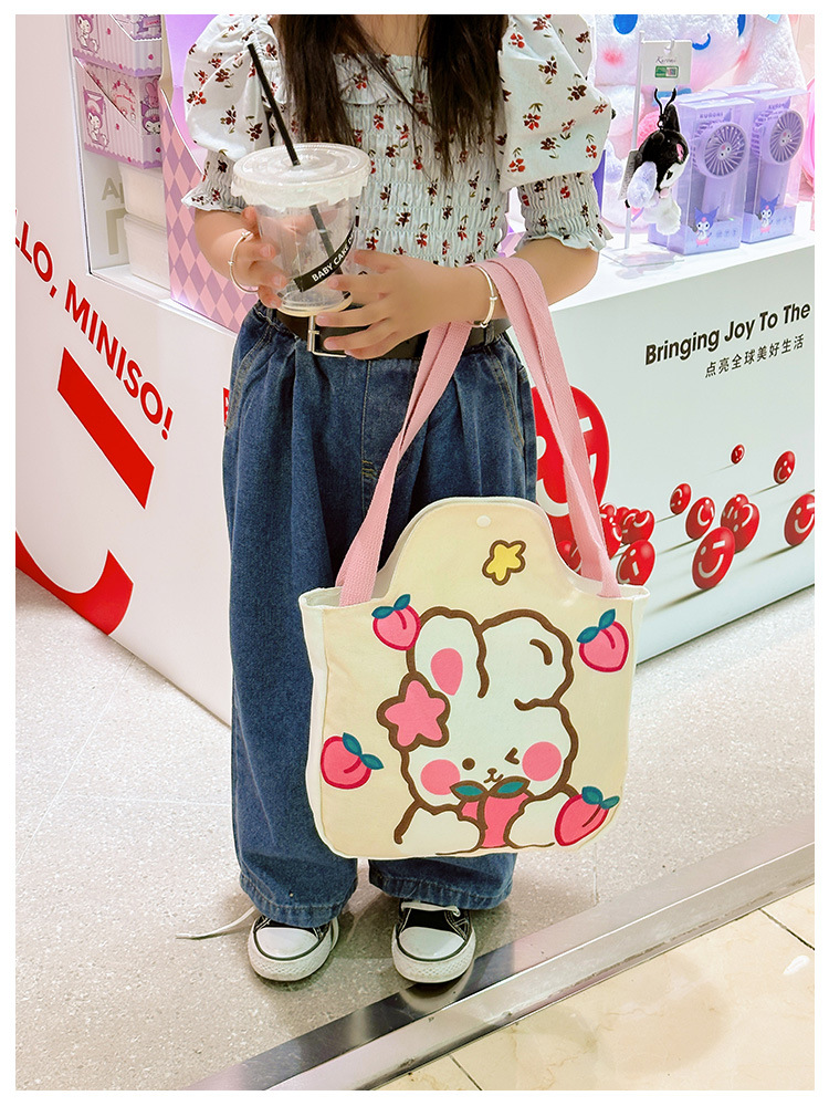Wholesale cartoon canvas bags, female student tutorial bags, Japanese-style illustration large-capacity single-shoulder bags, cute hand-carry bags undefined