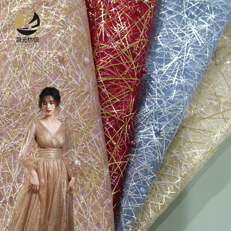 Fabricante línea de promoción de bajo precio estampado perla tela de malla ropa infantil ropa de moda de mujer vestido de boda tela