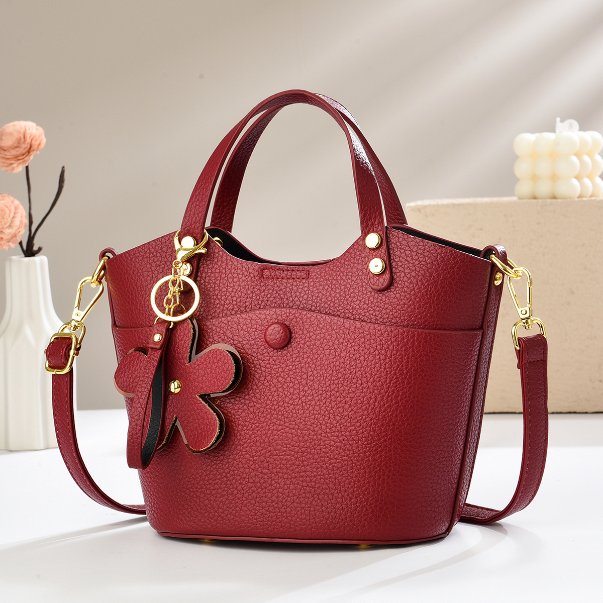 Exquisita bolsa de balde de verano 2025 nueva bolsa de hombro versátil textura mochila bolsos casuales bolsos transfronterizos