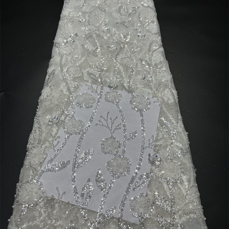 Tejido bordado de bordado de cuentas blancas de encaje de cuentas de tela de alta moda vestido de boda vestido de tela