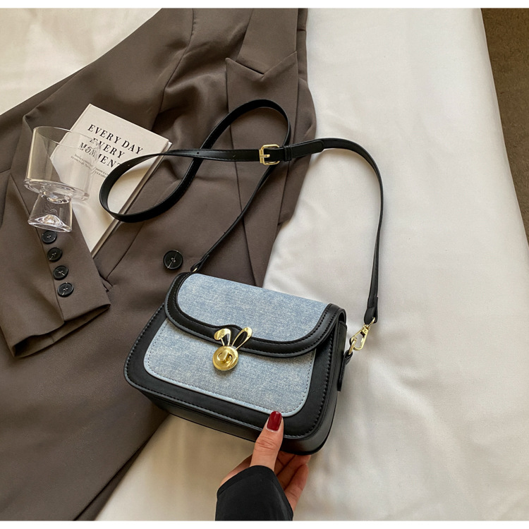 Texture denim saddle for women's 2024 summer new contrasting color lock buckle single shoulder bag, niche Western style_voghion.com