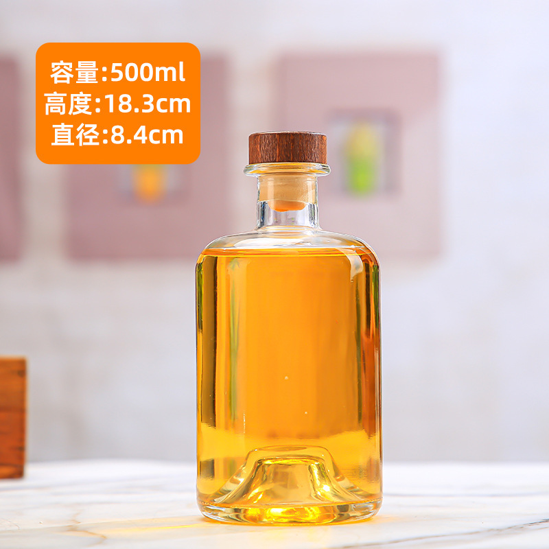 Botella de vodka al por mayor Botella de vino de fondo cóncavo Botella de vino extranjero Botella de vino amarillo de gran capacidad Botella de vino de ciruela transparente Botella de vino de frutas de vidrio