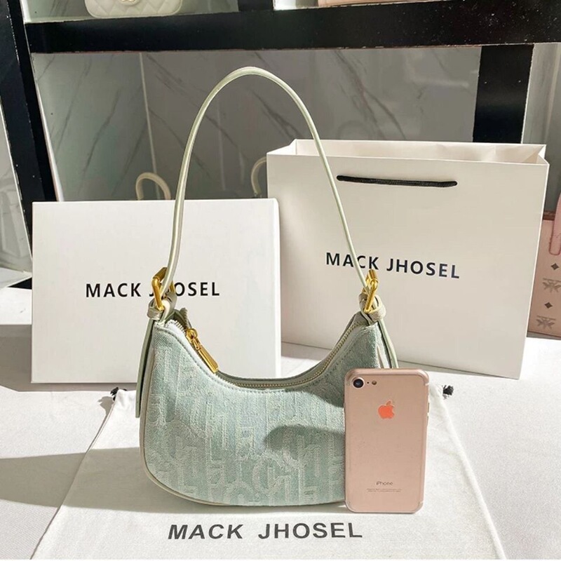 Hong Kong MrckJhol PU niche vintage canvas baguette underarm bag women's autumn and summer 2022 new shoulder bag