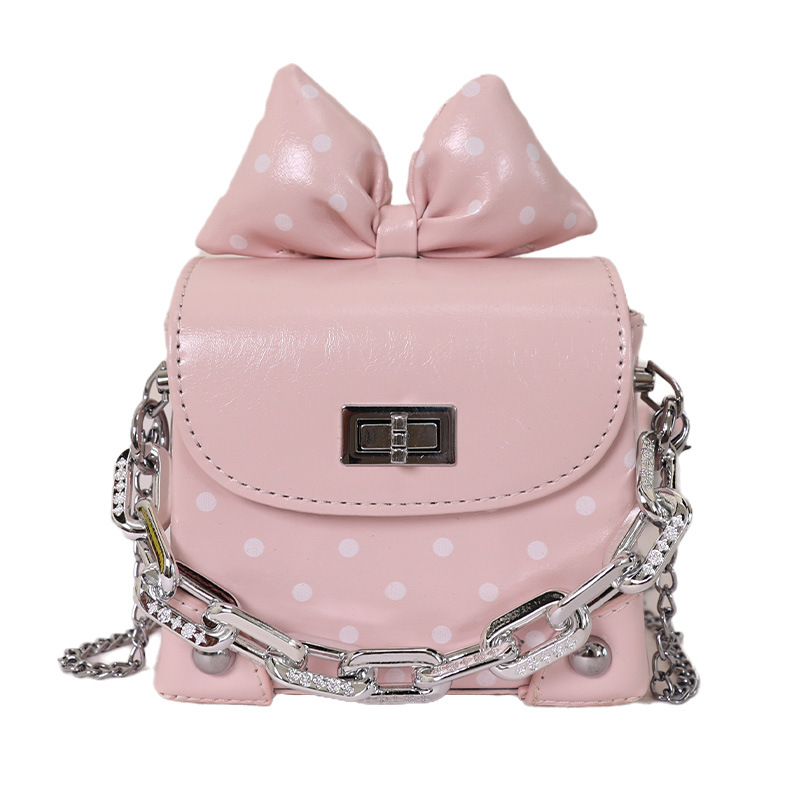 Nueva bolsa de cadena para mujeres 2026 nicho de diseño de moda mochila de hombro diaria popular onda punto bolso de caja cuadrada