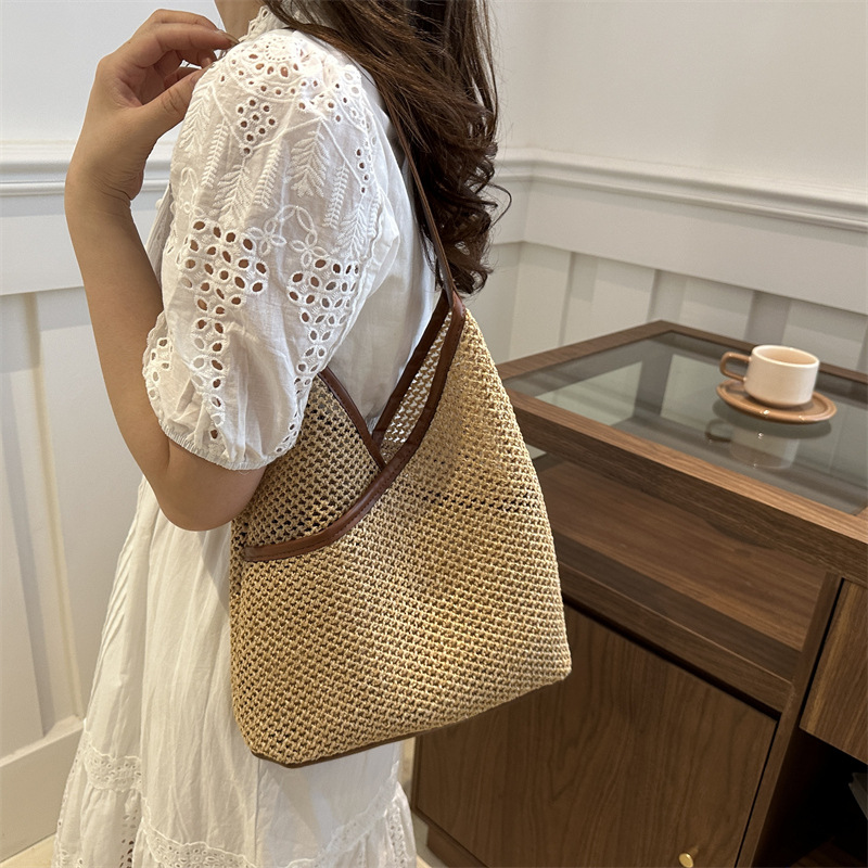 Popular bolsa de tejido de gran capacidad para mujeres 2024 verano nueva bolsa de hombro universal bolsa de viaje de moda