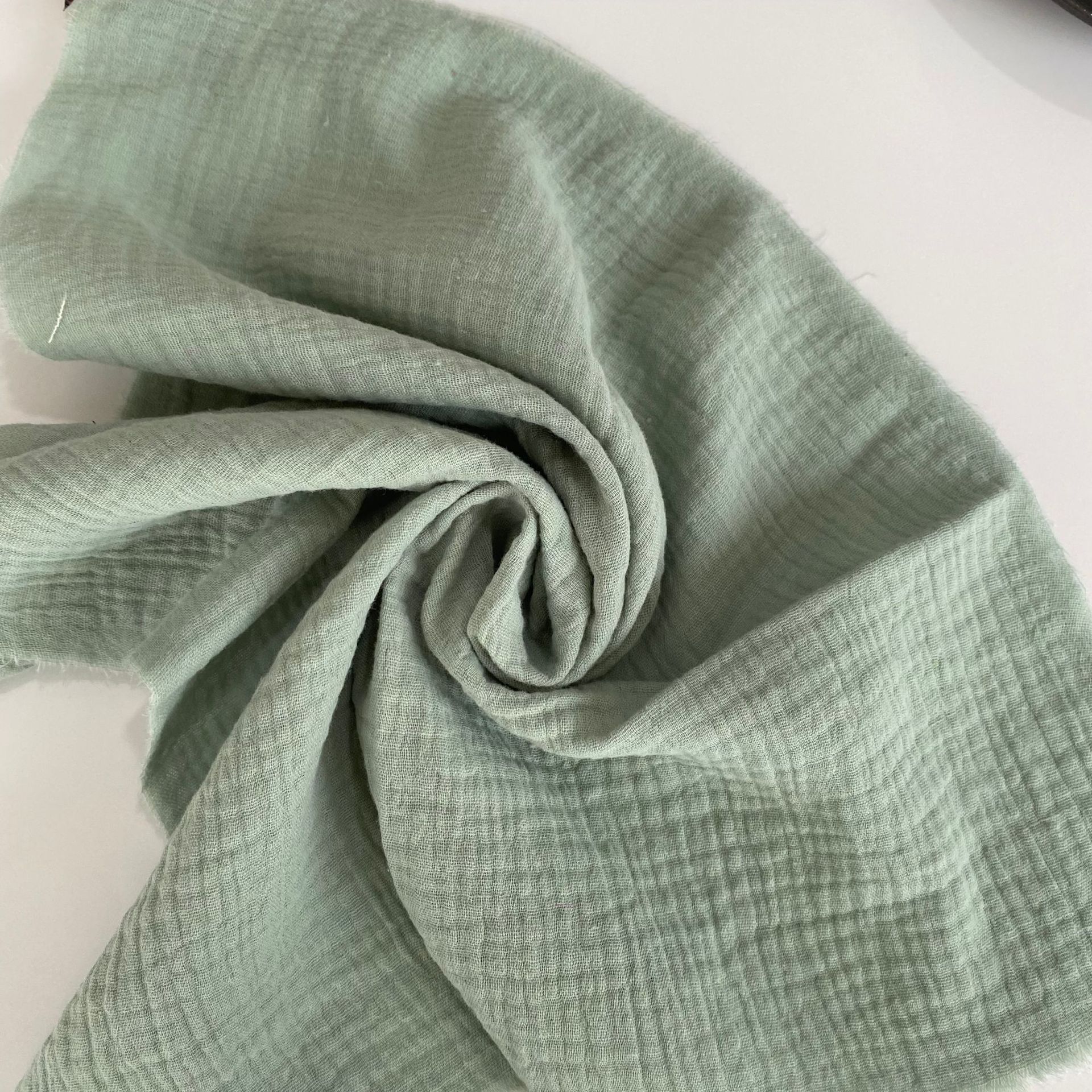 Servilleta de gasa de algodón de doble capa, tela de algodón crepé, mantel individual de algodón, paño de cocina decorativo, color liso, suministro directo de fábrica, mantel en stock