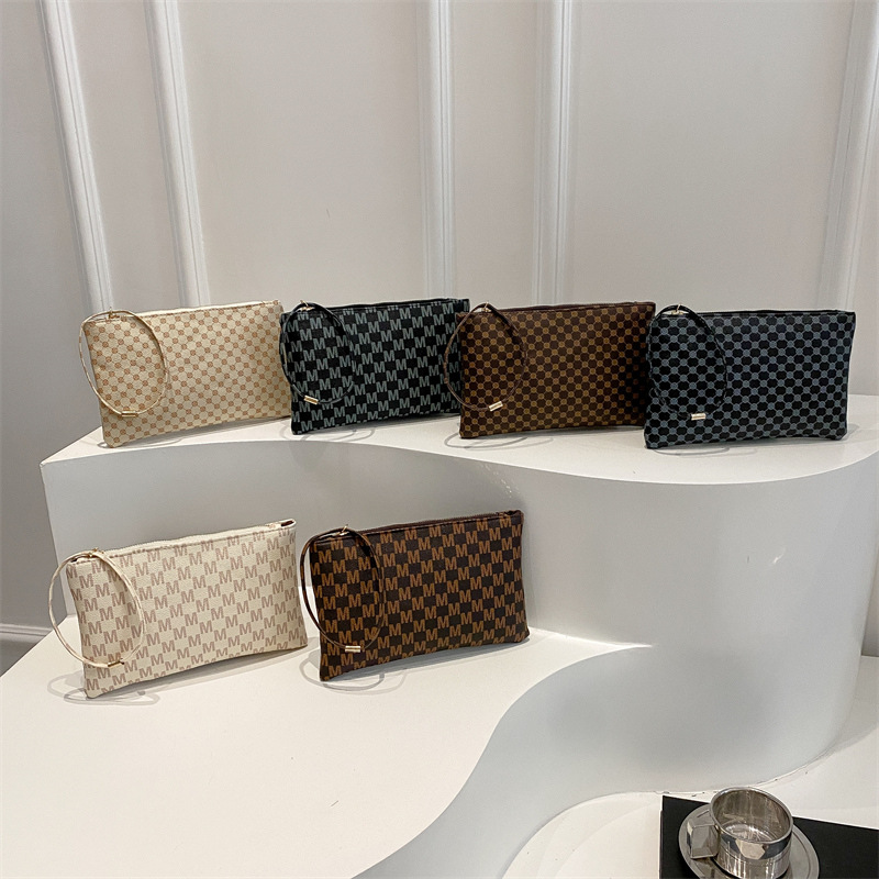 Impresión cuadrada otoño e invierno bolsas de mano casuales universales para mujeres de alta calidad temperamento simple nicho de moda bolsas de cena