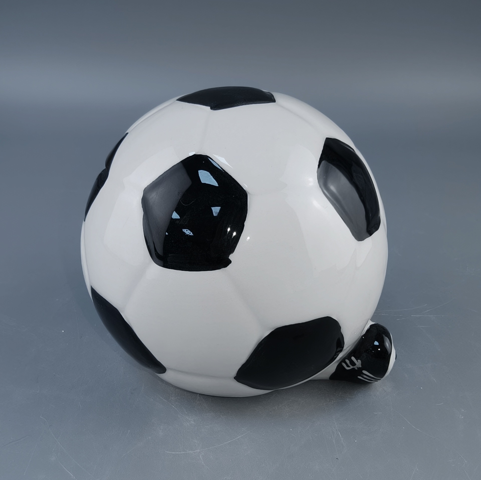 Cerámica transfronteriza estereoscópica encantadora expresión de fútbol lata de dinero Copa del Mundo artesanías cerámicas adornos de cerámica encantadores de escritorio