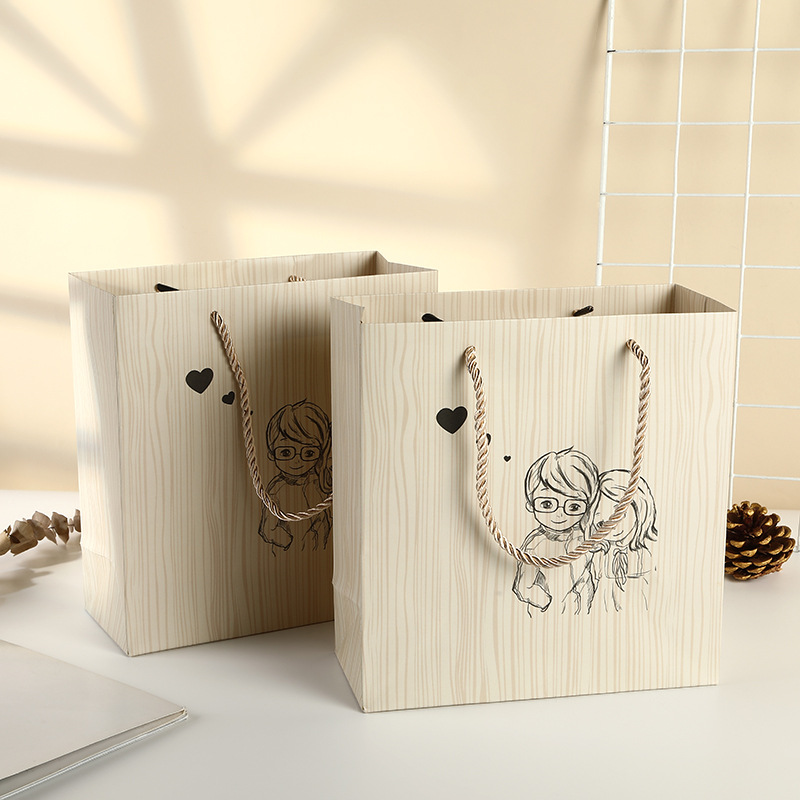七夕情人节情侣卡通手提袋 木纹印刷白卡纸袋 批发情人节礼品袋