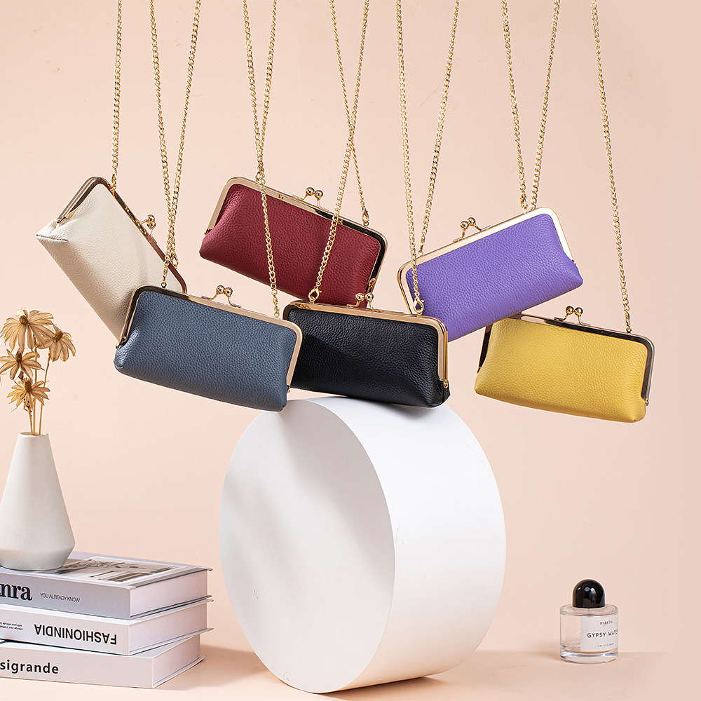 New top-grain cowhide fashionable European and American women's bag, portable and versatile shoulder and crossbody chain bag, evening clutch, light luxury