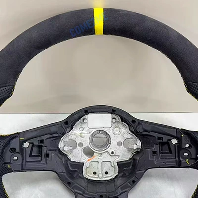 perforated material, yellow stitching, Steering wheel