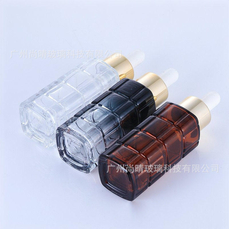 Nuevo en stock 30ml de alto grado a cuadros transparente esencia botella cuidado de la piel cosméticos esencia