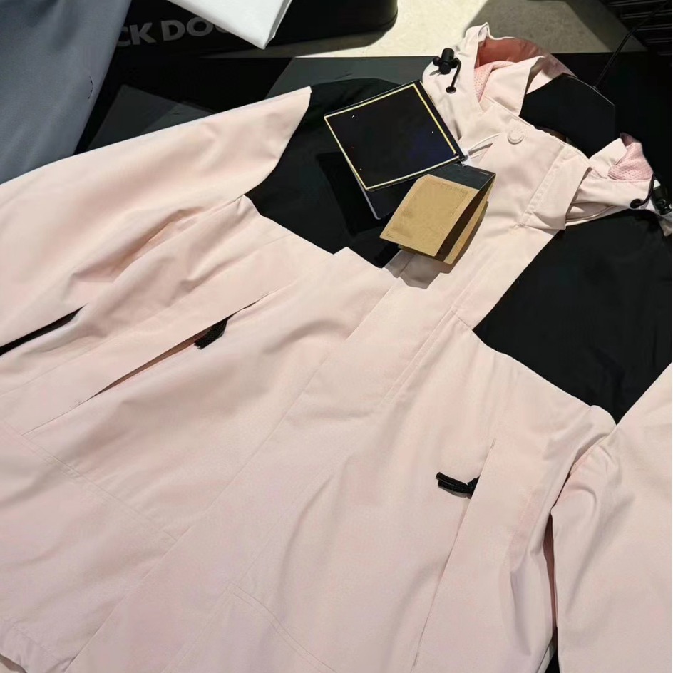 Chaquetas de costura modelos de primavera y otoño impermeables y a prueba de viento para hombres y mujeres del mismo estilo chaqueta de pareja gabardina de nicho