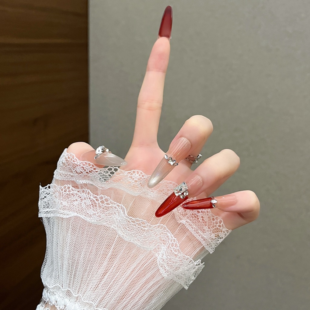 Uña hecha a mano Uña al por mayor Uña de vestir parche de uñas largo otoño invierno ojo de gato rojo Uña falsa de alta calidad