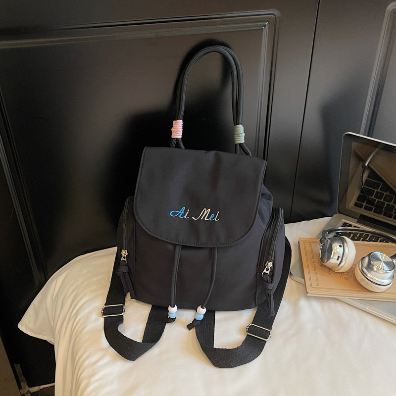 Los estudiantes de tendencia en clase nicho mochila de hombro mujer estilo exterior sensación de diseño de color sólido sensación de moda mochila universal image 10