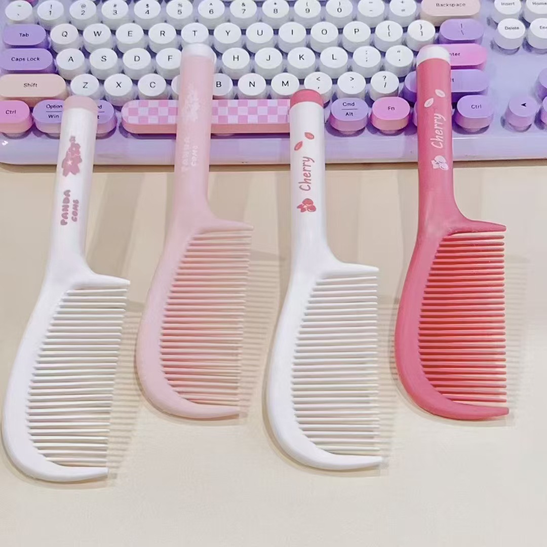 Nuevo paquete de impresión de cuerda de colgante independiente de trigo rollo de peinado de plástico peinado de belleza tienda de dos yuanes asequible