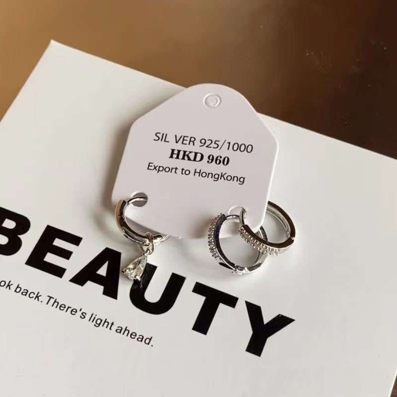 Jennie con gota de agua asimétrica simple pequeño aretes dos aretes personales aretes coreanos nuevos para mujeres